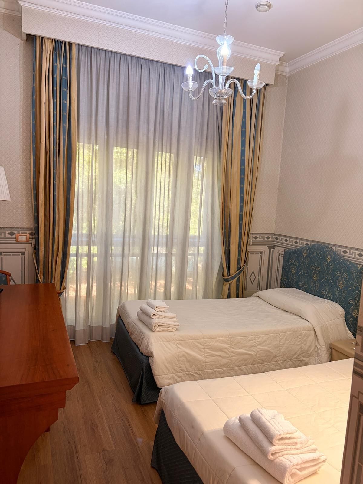 Desk, blackout curtains, soundproofing, bed sheets