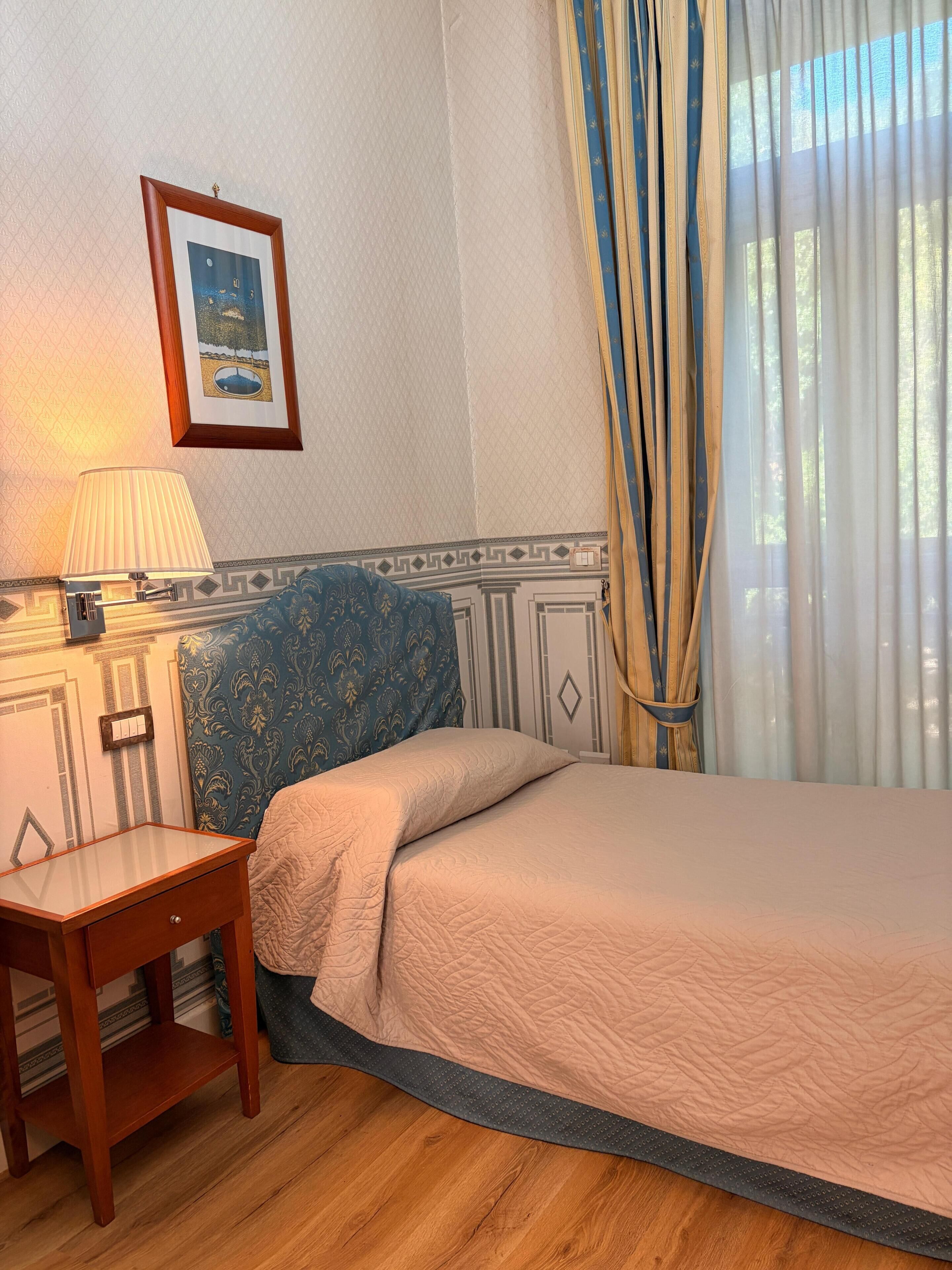 Desk, blackout curtains, soundproofing, bed sheets