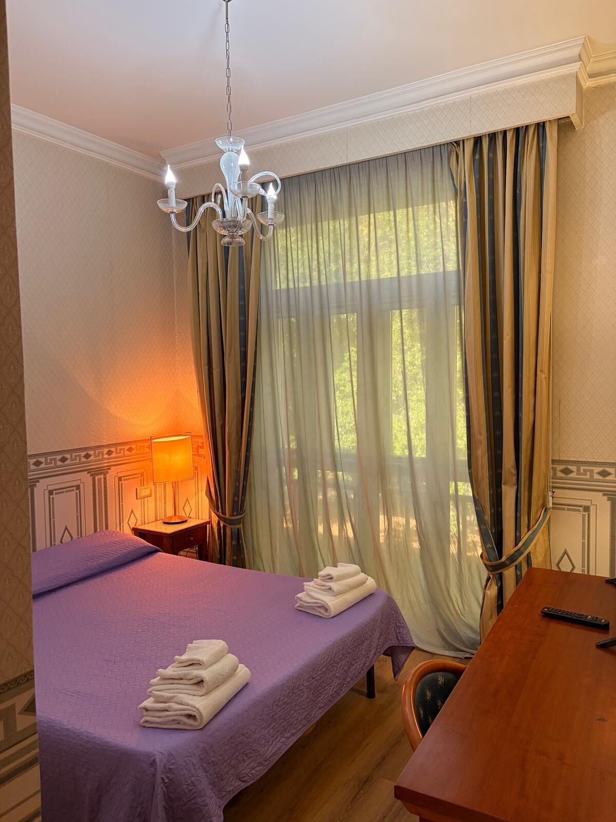 Desk, blackout curtains, soundproofing, bed sheets