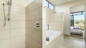 Award Winning Luxury Holiday Home | Bathroom | Separate tub and shower, free toiletries, hair dryer, bathrobes