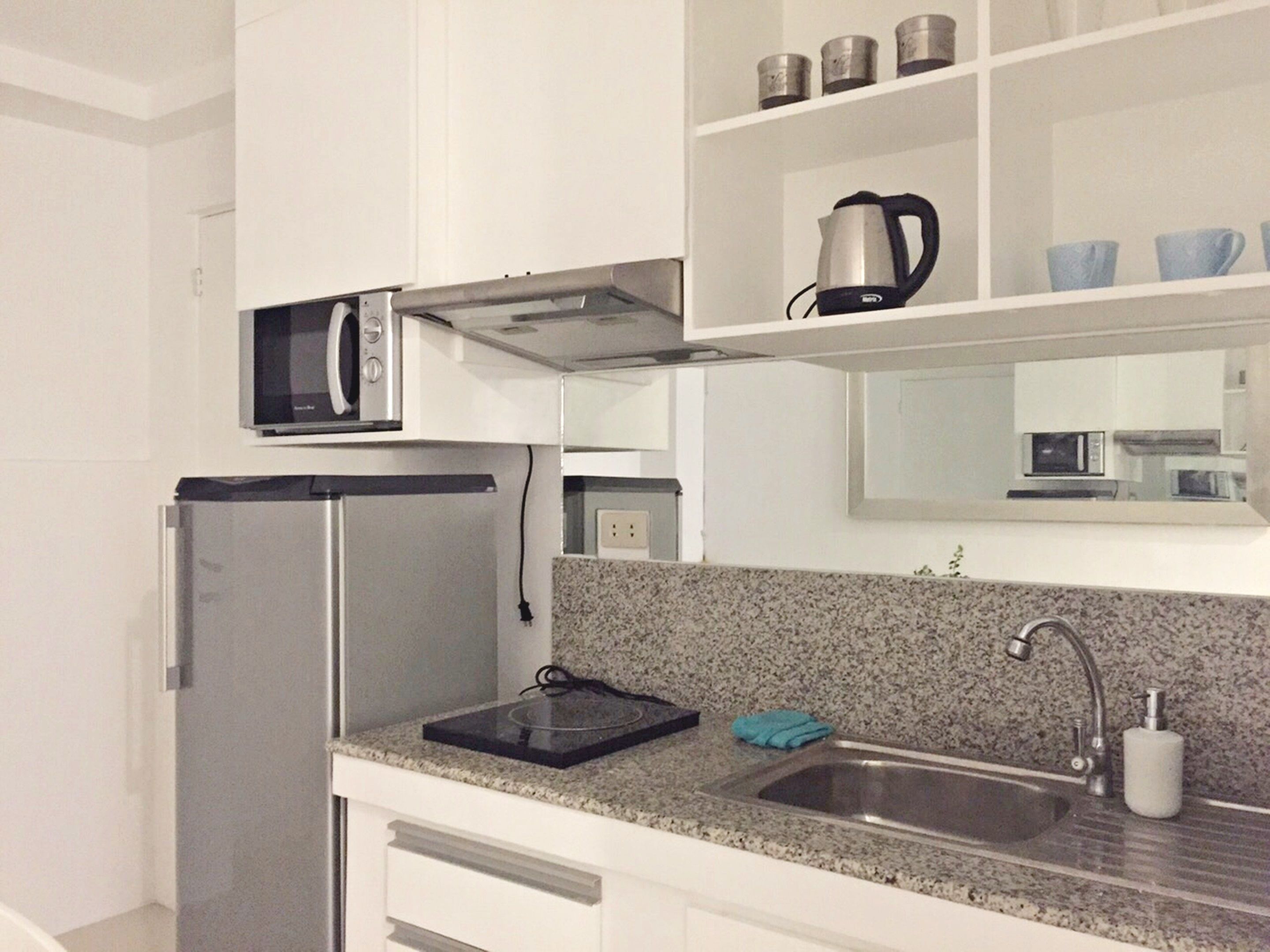 Full-sized fridge, microwave, stovetop, rice cooker