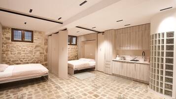 2 bedrooms, desk, iron/ironing board, travel crib