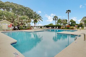 A swimming pool with lounge chairs, a pool rules sign, and a 3ft depth marker. - Award-Winning Resort Amenities | Mariners Walk 7F (Isle of Palms)