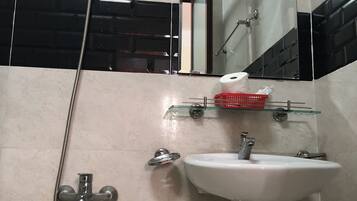 Shower, free toiletries, hair dryer, slippers