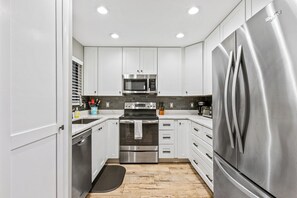 Fridge, microwave, stovetop, coffee/tea maker