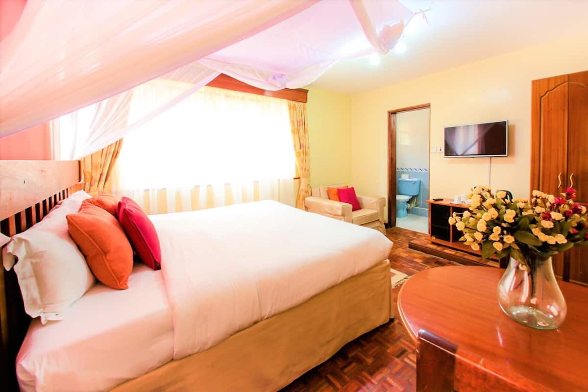 Deluxe kamer, 1 twee- of 2 eenpersoonsbedden, 1 kingsize bed, privébadkamer, hoek | Lakens van Egyptisch katoen, luxe beddengoed, Tempur Pedic-bedden