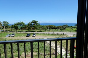 Kamar Quadruple Comfort, 2 Tempat Tidur Queen, balkon, menghadap laut | Balkon