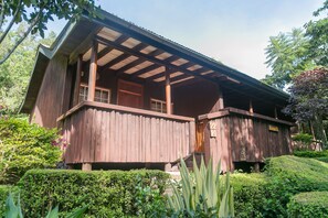 A wooden building with a covered porch and a sign reading "22". - Naro Moru River Lodge (Naro Moru)