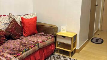 Comfort Condo, 1 Bedroom, Balcony | Living area | 55-inch Smart TV with digital channels, TV