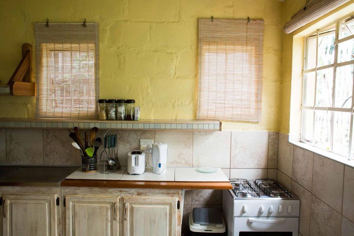 Suite Keluarga, pemandangan gunung | Dapur pribadi | Mesin pembuat kopi/teh, lemari es besar, microwave, dan oven