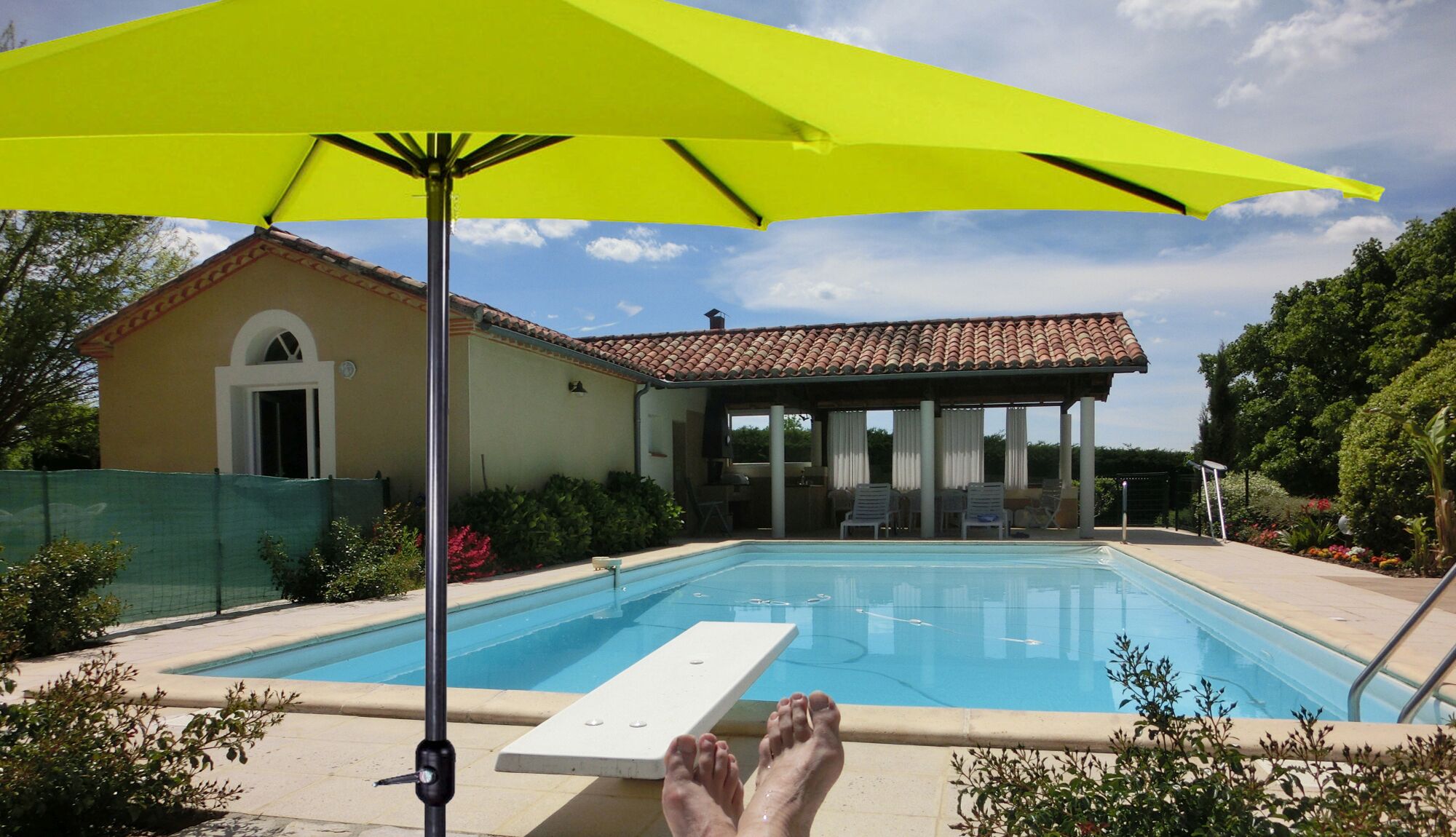 Outdoor pool, open 9 AM to 10 PM, pool umbrellas