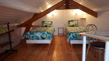 Comfort House, 2 Bedrooms, Pool Access | Blackout curtains, soundproofing, iron/ironing board, rollaway beds