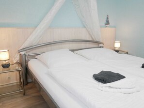 1 habitación, cuna de viaje y ropa de cama 