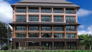 A multi-story building with a flat roof, large windows, and balconies. - B&Y Residence (Chiang Mai)