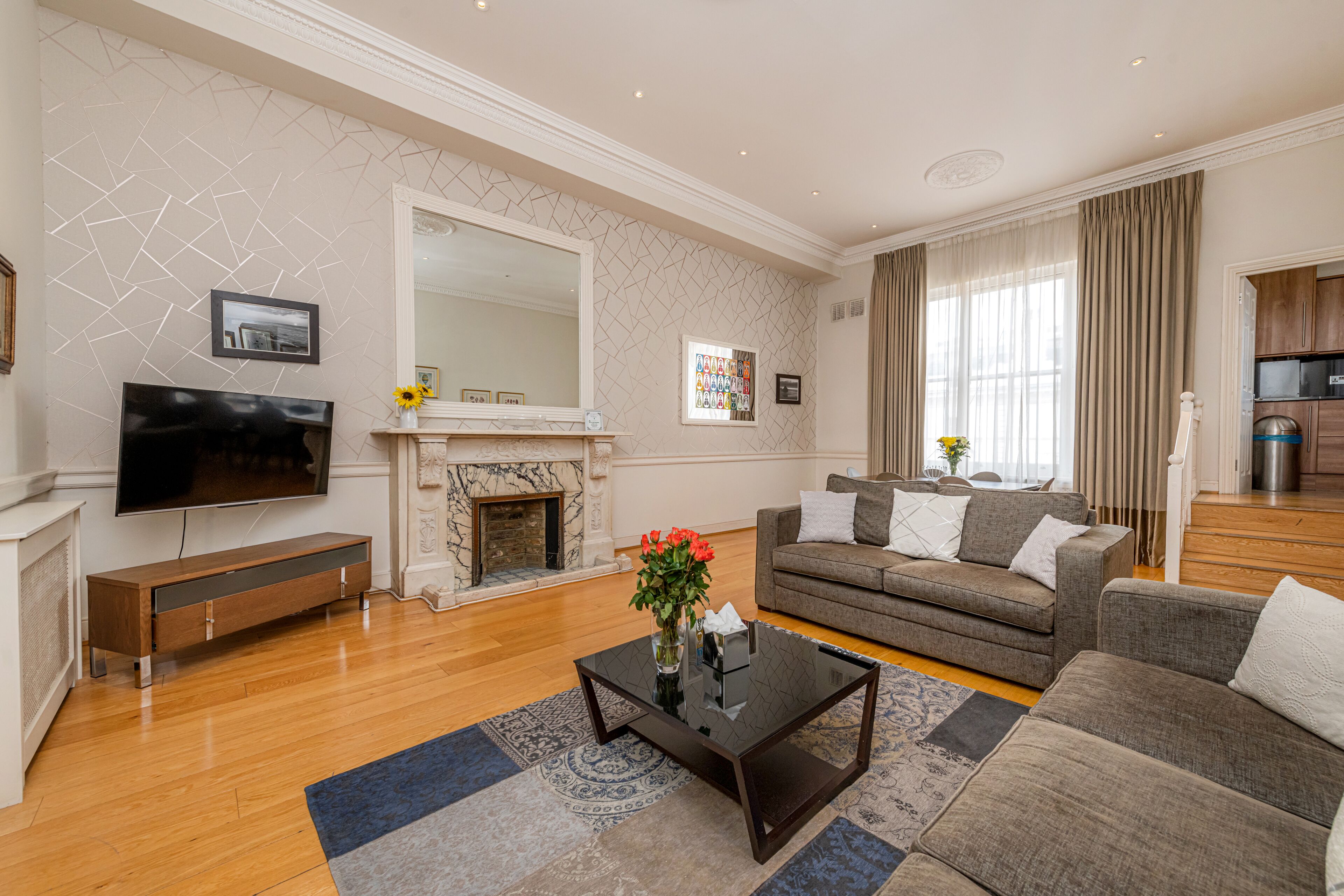 Deluxe Apartment 2 Bedrooms | Living area | LCD TV, DVD player, iPod dock