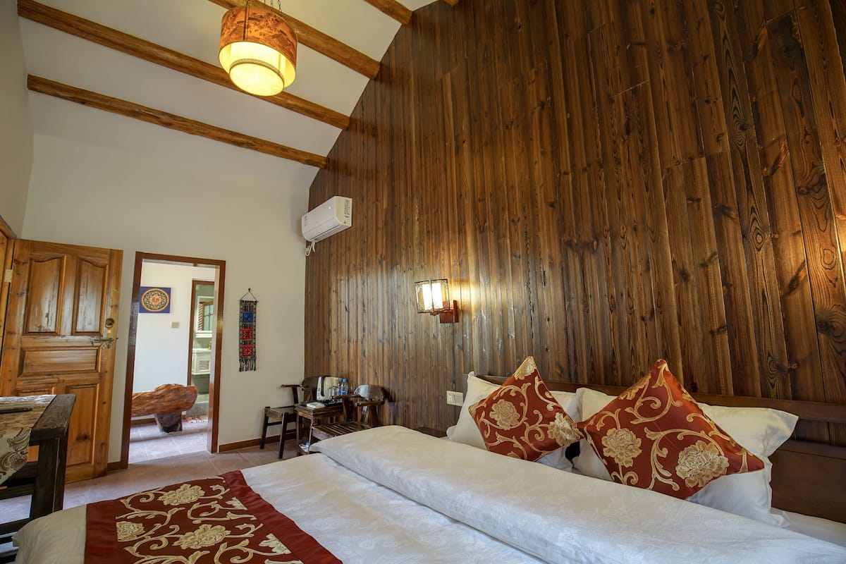 Double Room with Private Balcony (Citizens or residents of China Only) | Desk, blackout drapes, free WiFi, bed sheets