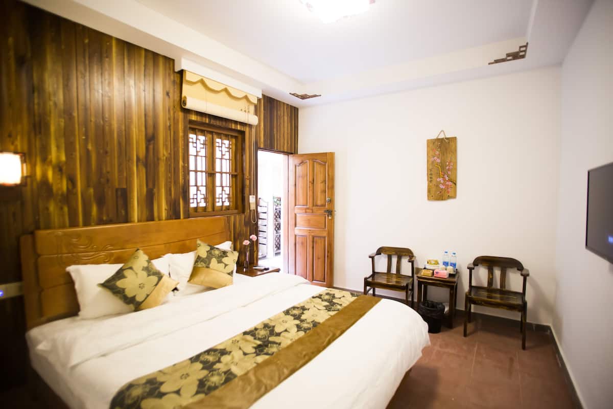 Double Room with Garden View (Citizens or residents of China Only) | Desk, blackout drapes, free WiFi, bed sheets