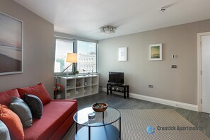 Deluxe Double Room | Living area | Smart TV