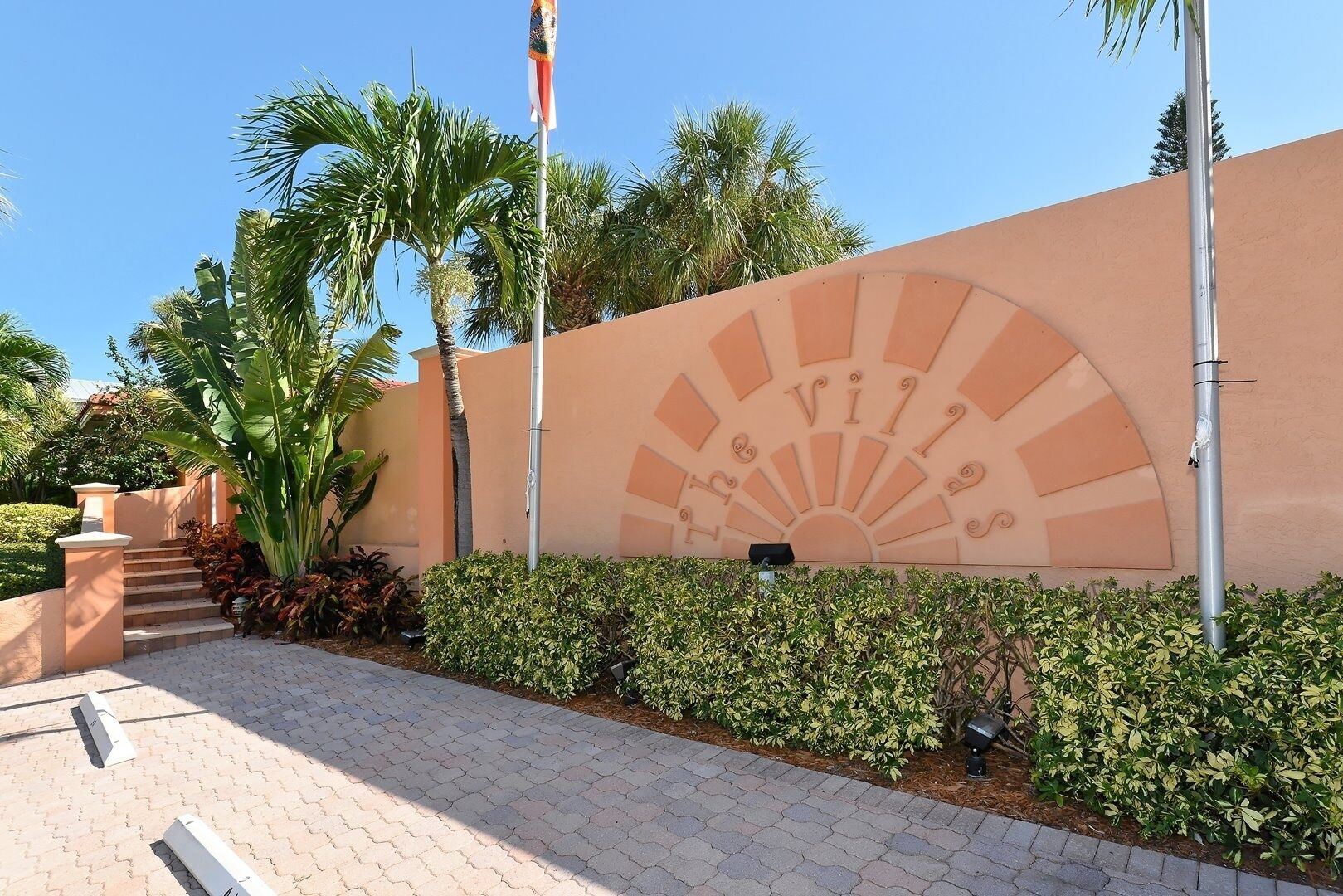 A building facade with a sunburst design and the word "Villa" prominently displayed.