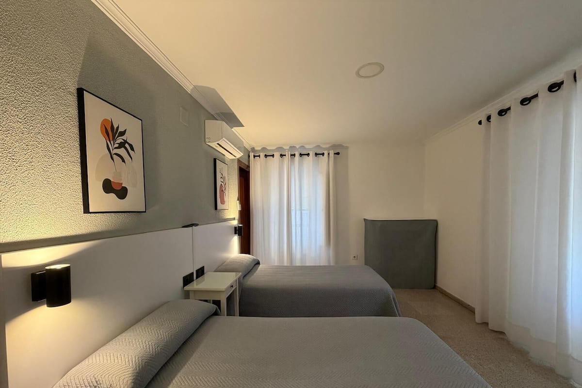 Desk, blackout curtains, free WiFi, bed sheets