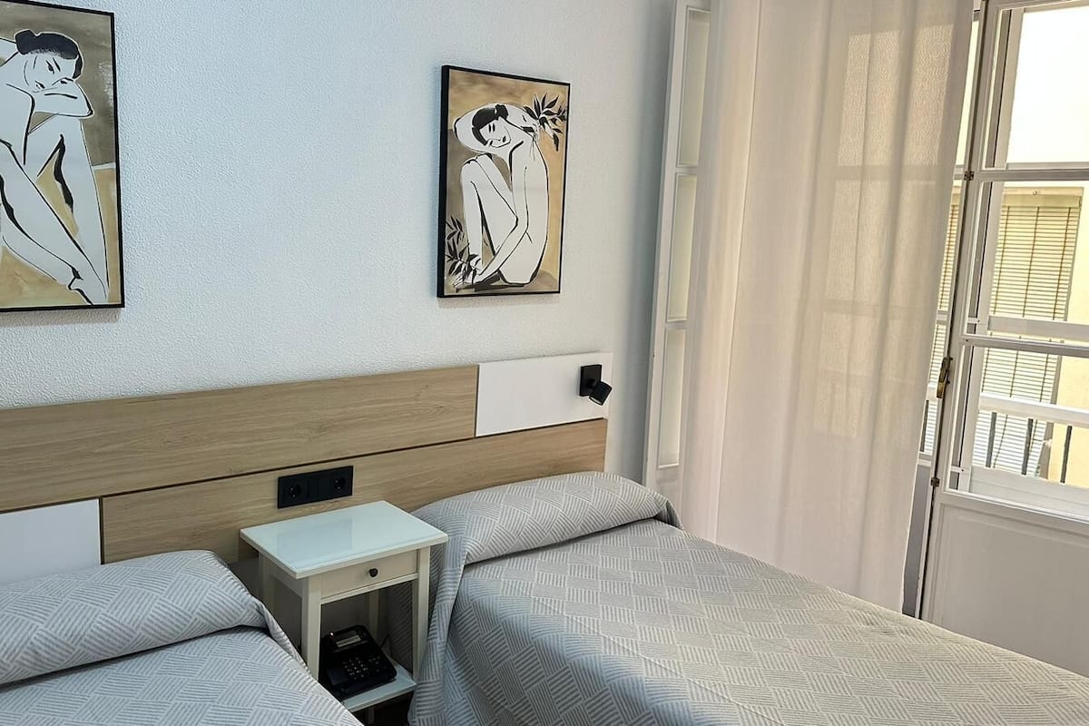 Twin Room | Desk, blackout drapes, free WiFi, bed sheets