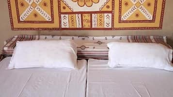 Mud Huts | 1 bedroom, rollaway beds, bed sheets
