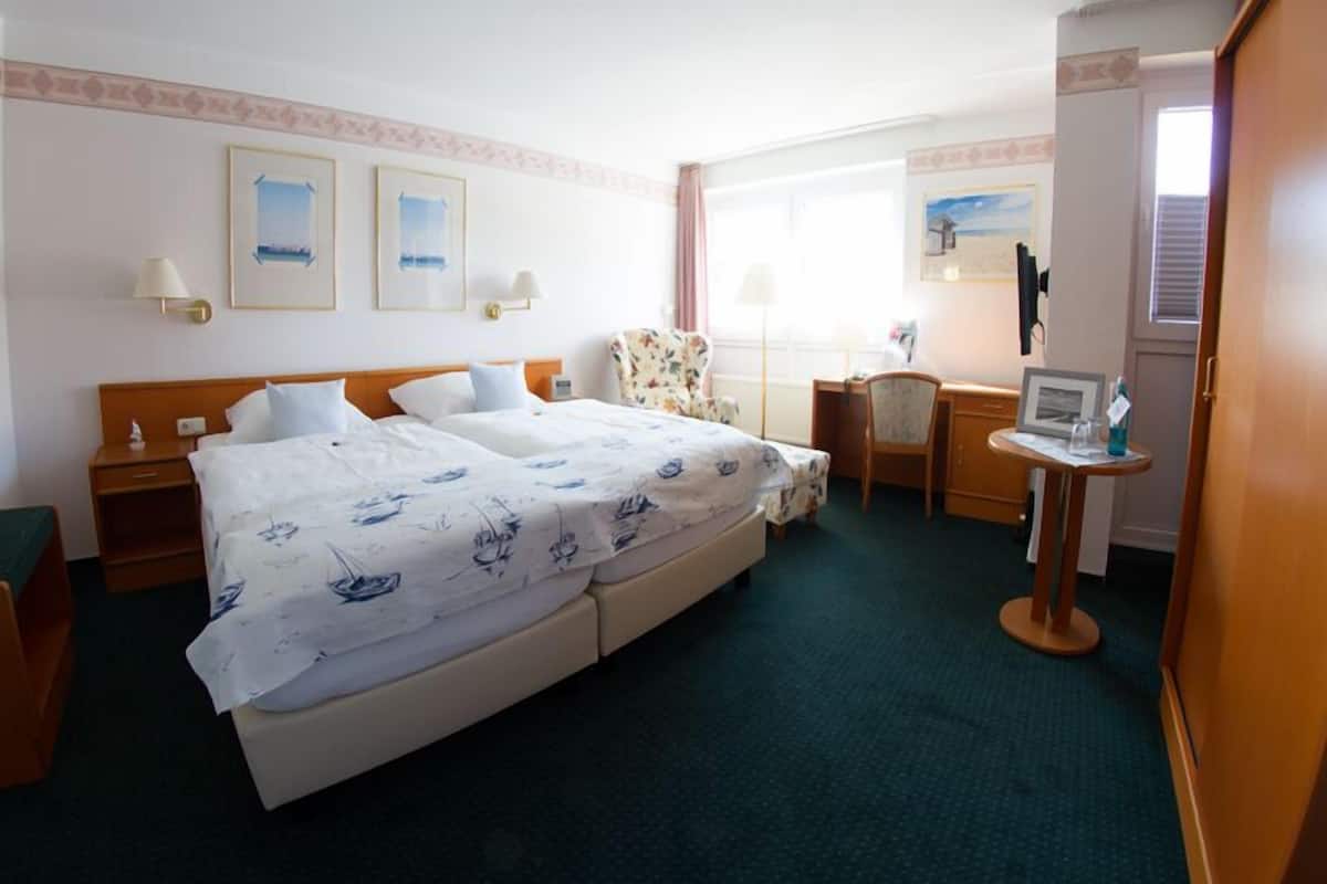 In-room safe, iron/ironing board (on request), free cots/infant beds