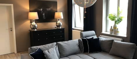 Condo | Salle de séjour | Téléviseur à écran plat
