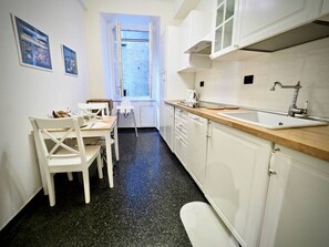 Apartment, 1 Bedroom | Private kitchen | Fridge, oven, stovetop, cookware/dishes/utensils - Dimora Degli Indoratori Zona Acquario (Genoa)