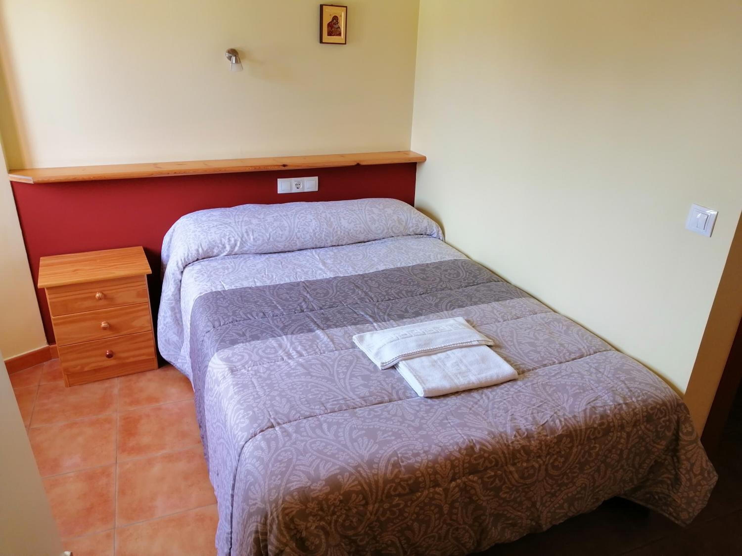 premium bedding, desk, iron/ironing board, rollaway beds