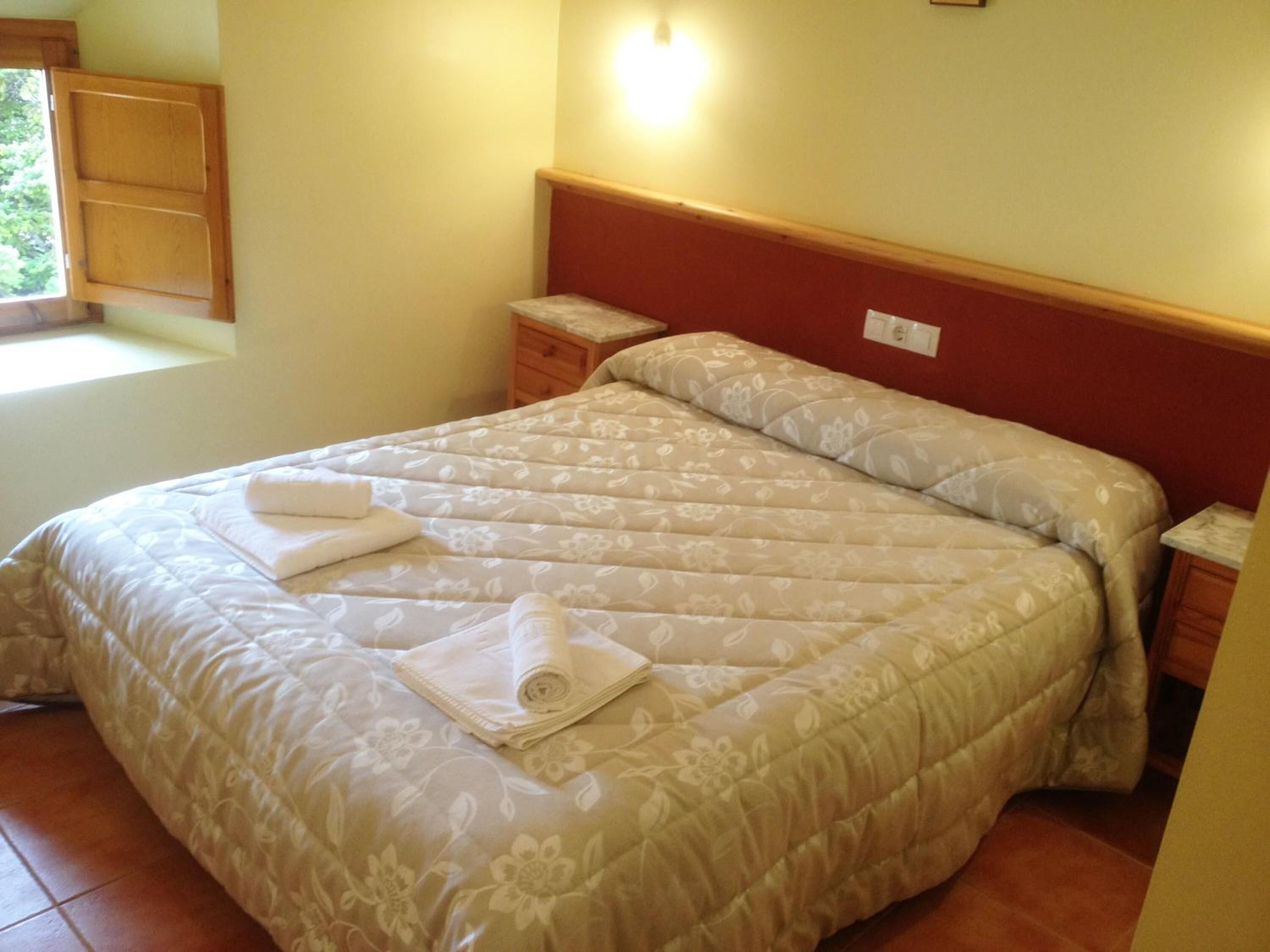 premium bedding, desk, iron/ironing board, rollaway beds