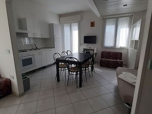 Apartment, 2 Bedrooms, Accessible | Private kitchen | Fridge, microwave, stovetop, dishwasher