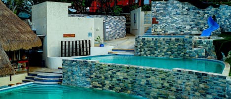 3 outdoor pools, open 9:00 AM to 9:00 PM, pool umbrellas
