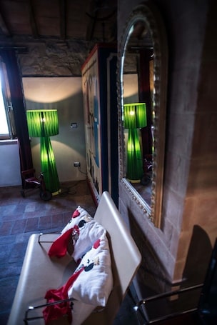 Deluxe Quadruple Room, 2 Bedrooms | Living area | TV