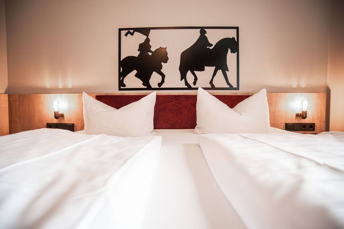Desk, blackout drapes, WiFi (free), bed sheets