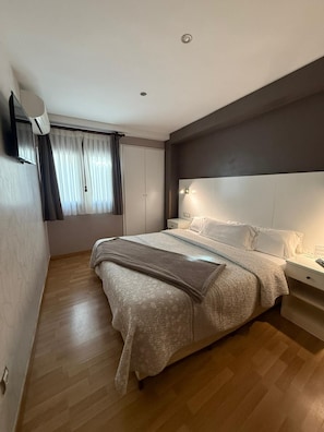 Standard Double Room | Blackout drapes, iron/ironing board, free WiFi, bed sheets