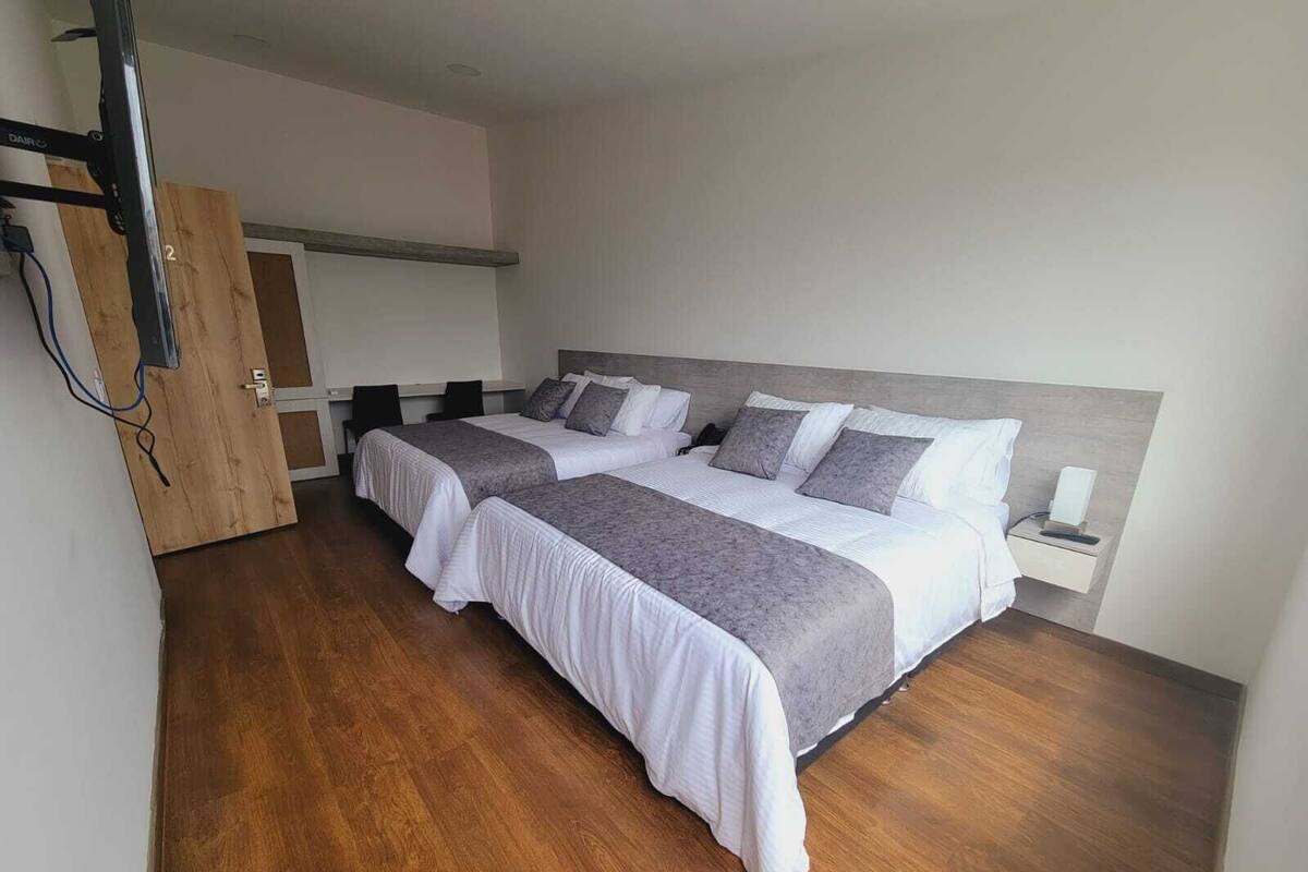 Standard Quadruple Room, 2 Queen Beds | Premium bedding, in-room safe, desk, iron/ironing board