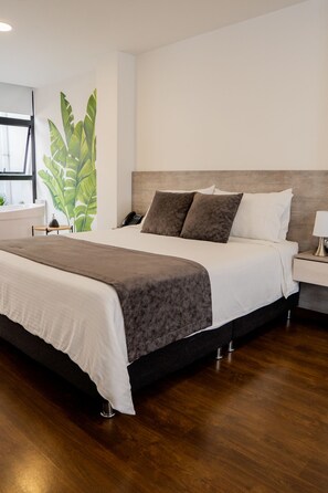 Habitación Elite | Ropa de cama de alta calidad y caja de seguridad en la habitación