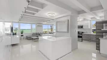 Apartment, 3 Bedrooms | Living area | Flat-screen TV