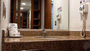 Shower, free toiletries, hair dryer, towels