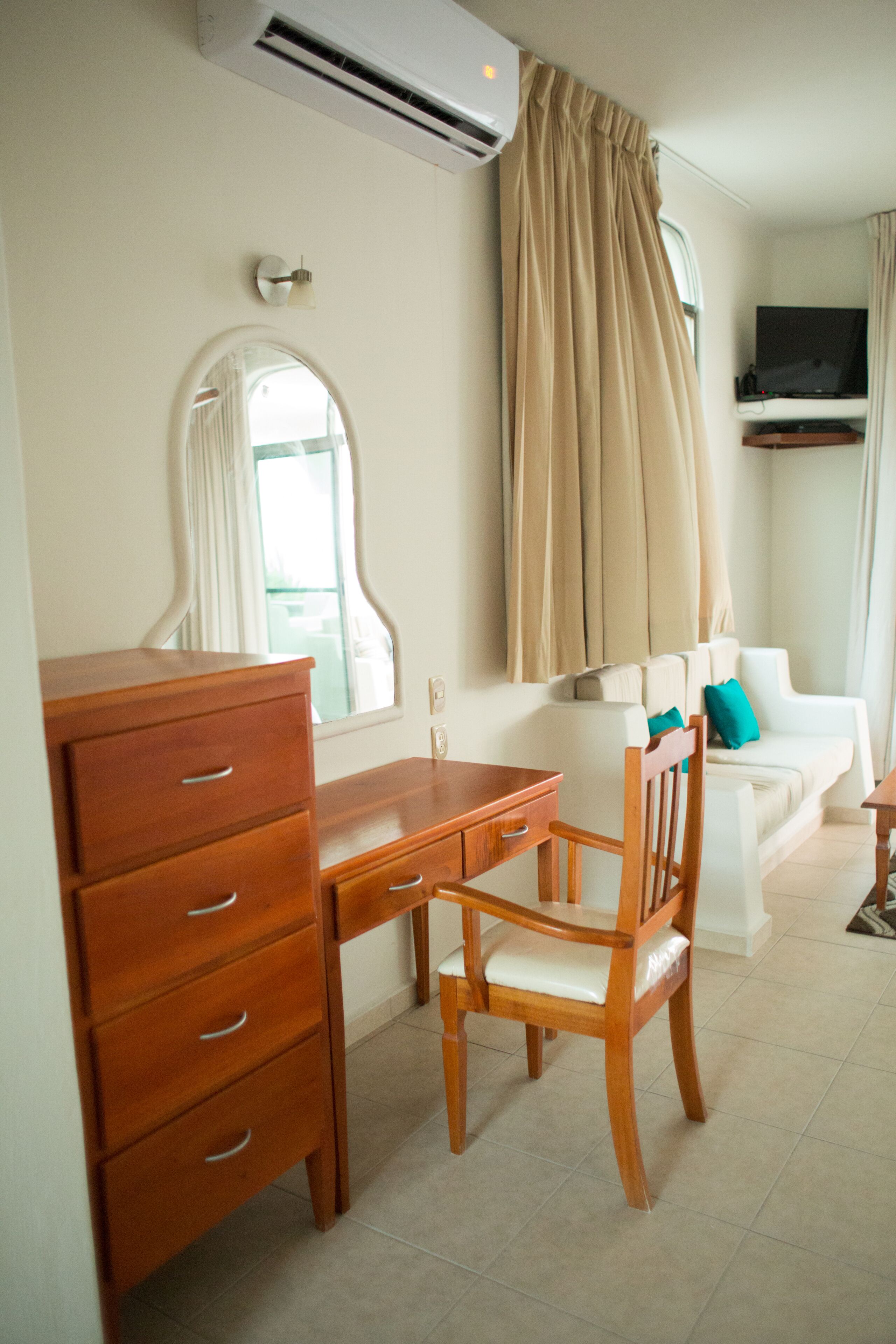 studio suite, 2 queen beds, sea view, oceanfront | living room | 49-inch flat-screen tv with digital channels