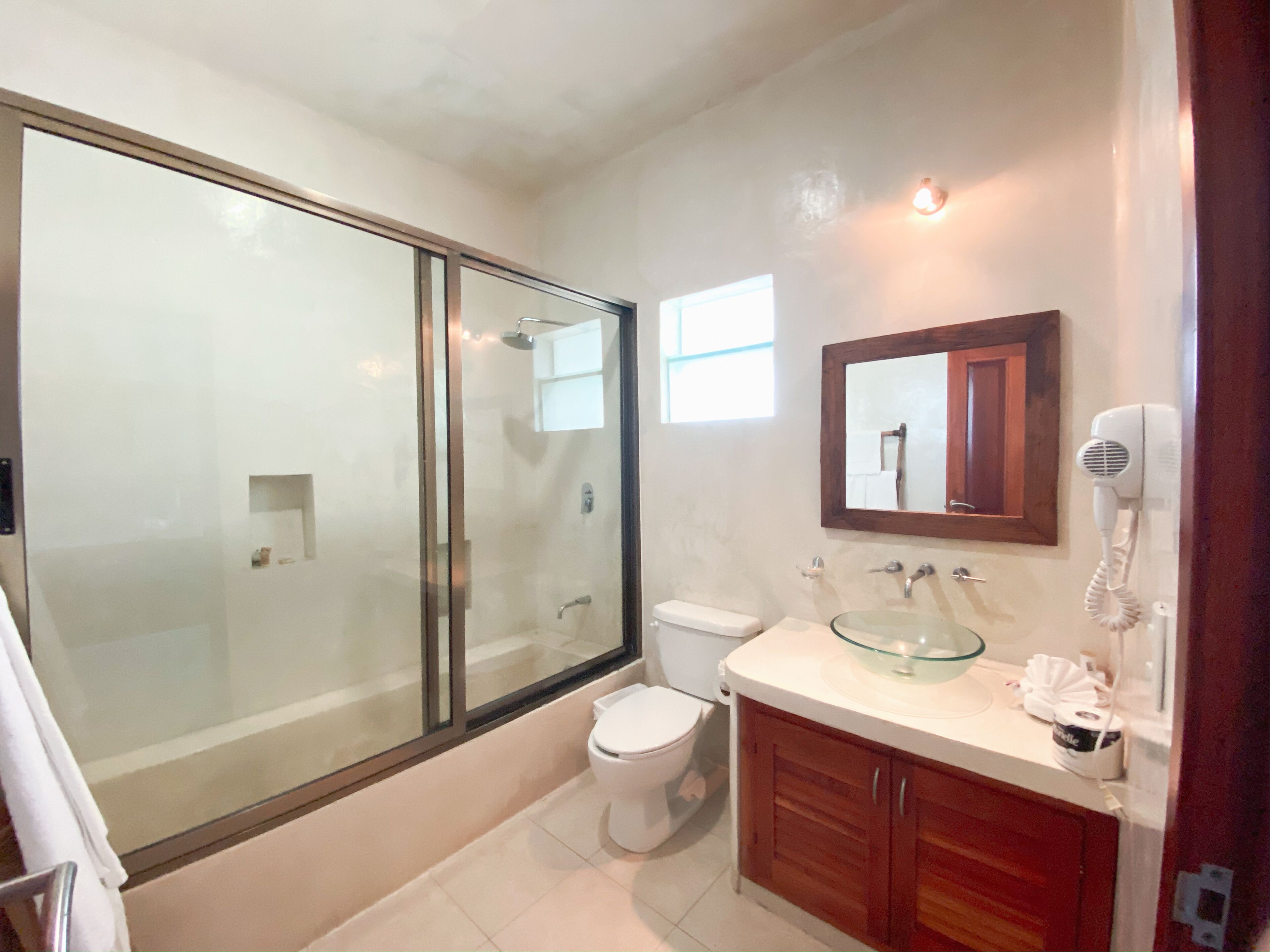 double room, 1 king bed, ocean view, beachfront | bathroom | free toiletries, hair dryer, towels, soap