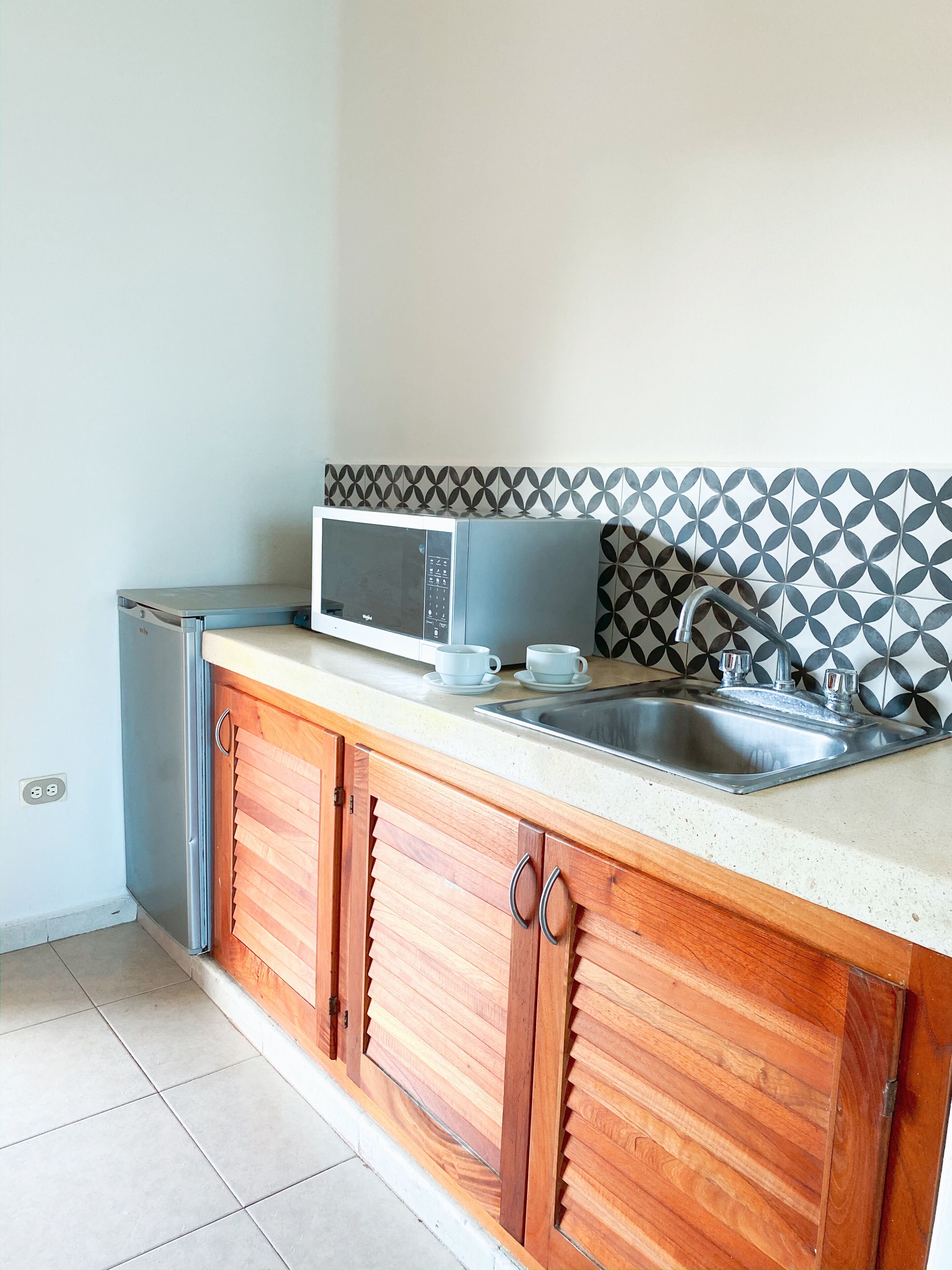 double room, 1 king bed, ocean view, beachfront | private kitchenette | coffee/tea maker, kitchen islands