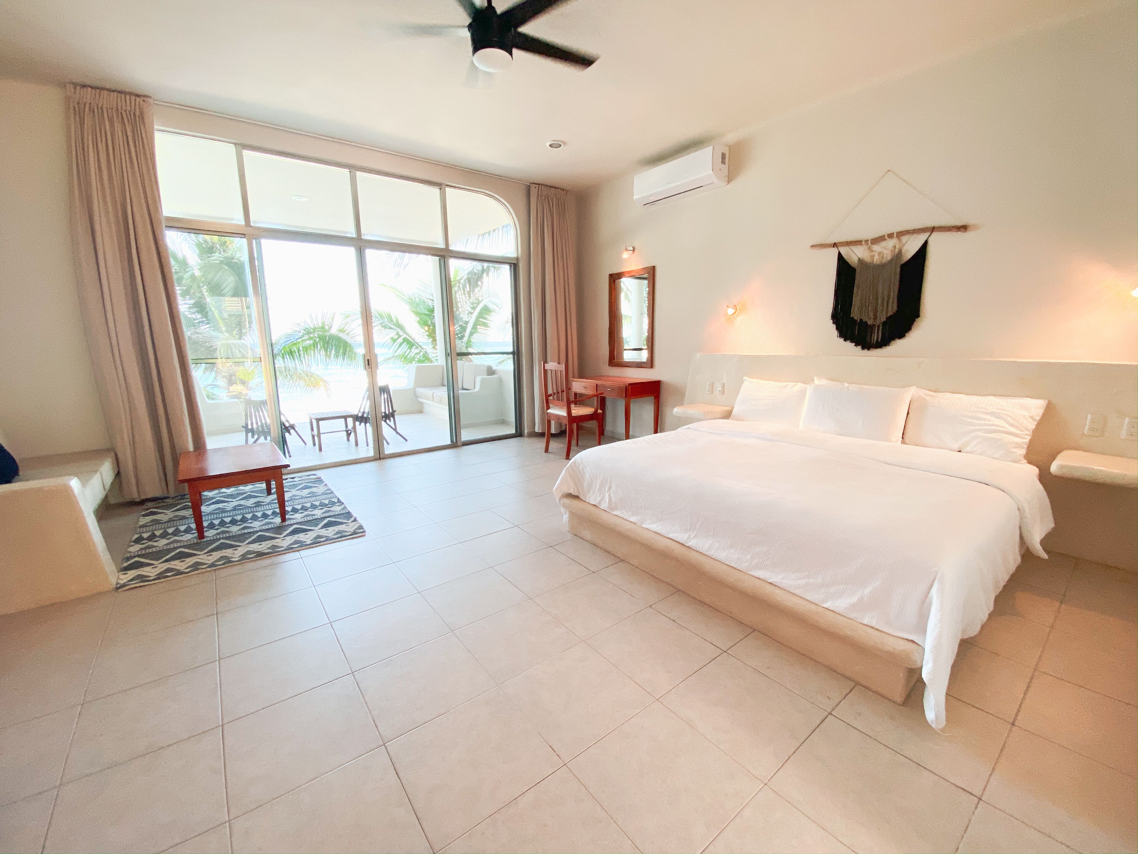 double room, 1 king bed, ocean view, beachfront | in-room safe, individually decorated, individually furnished