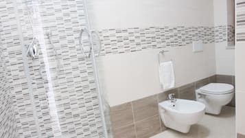 Shower, free toiletries, hair dryer, bathrobes