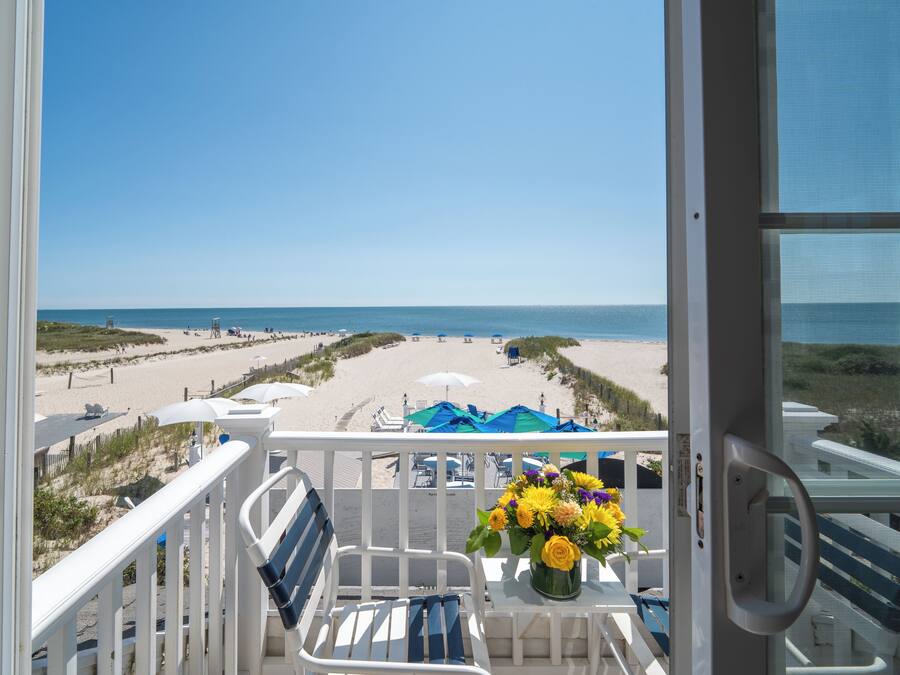 Deluxe Room, 1 King Bed, Balcony, Beach View | Pillowtop beds, individually decorated, individually furnished