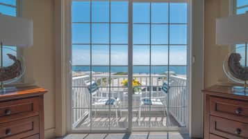Deluxe Room, 1 King Bed, Balcony, Beach View | 1 bedroom, pillow-top beds, individually decorated