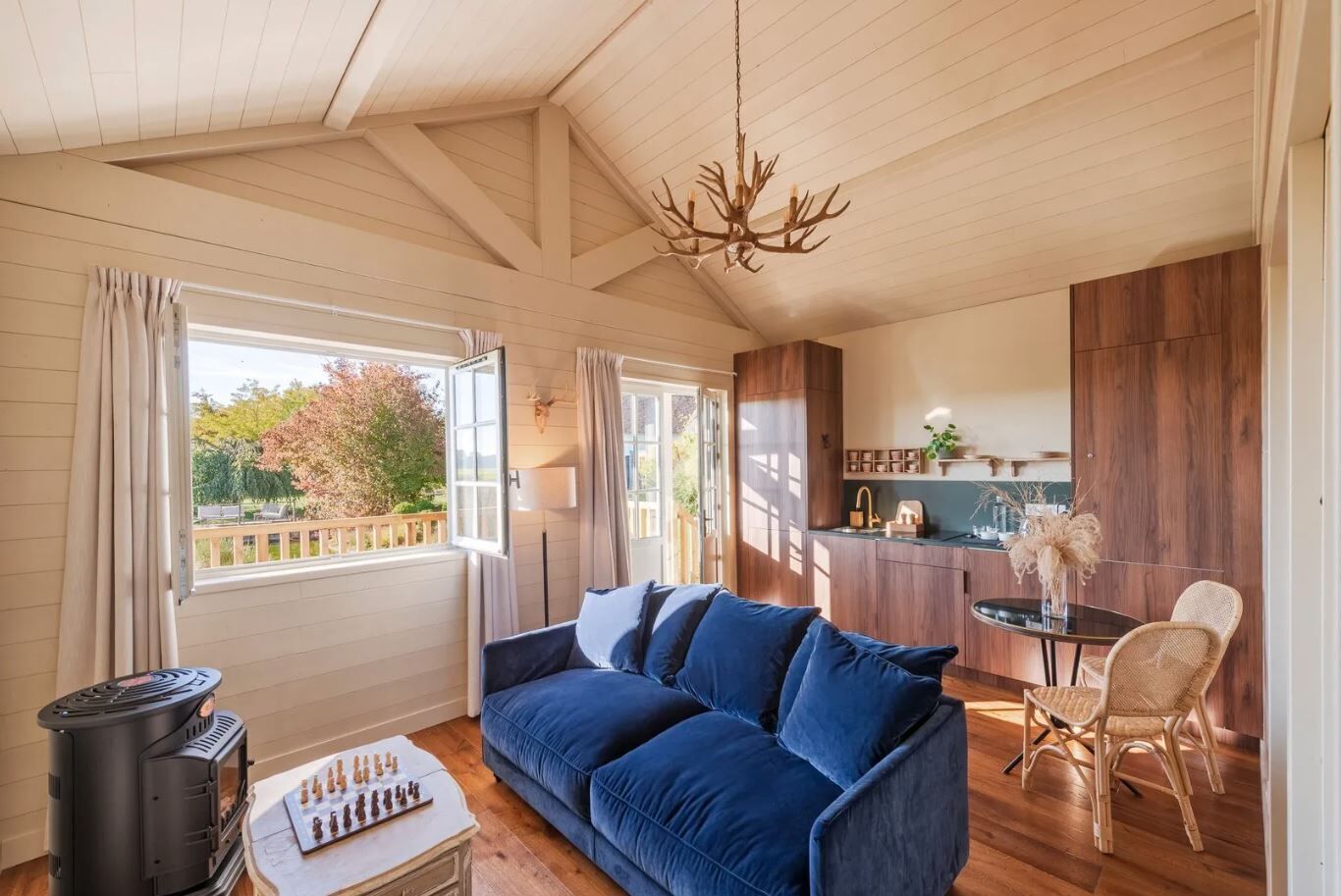 Cottage, Lake View | Living area | Flat-screen TV, pay films