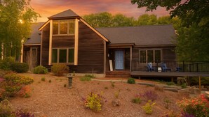 A modern two-story house with a covered porch and a landscaped garden. - Sun, Sand, and Serenity: Only 3 peak weeks remaining - Includes Private Beach (Eastham)