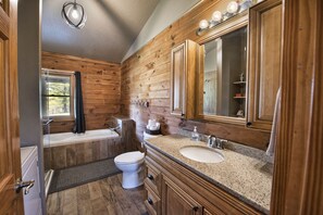 Combined shower/tub, jetted tub, hair dryer, towels